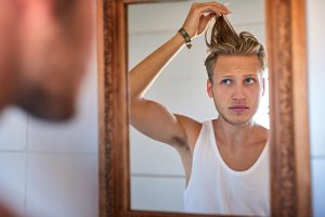 محصولات تقویت کننده موی مردانه